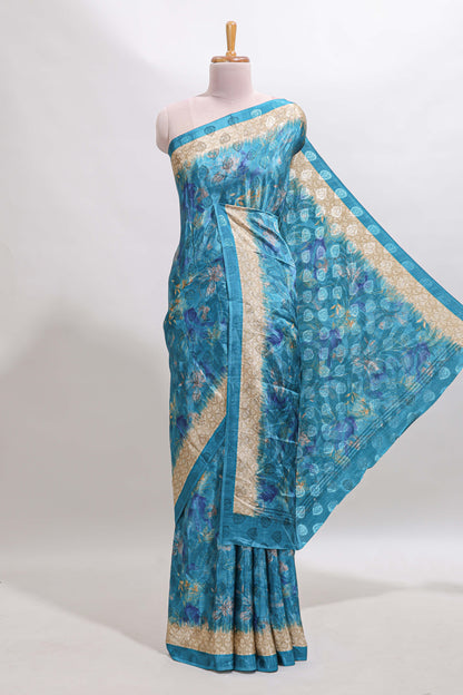 Blue floral design georgette saree with contrast border and matching blouse