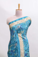Blue floral design georgette saree with contrast border and matching blouse