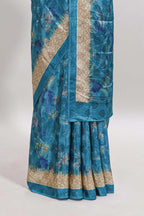 Blue floral design georgette saree with contrast border and matching blouse