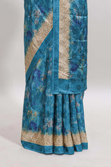 Blue floral design georgette saree with contrast border and matching blouse
