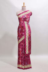 Magenta floral design georgette saree with contrast border and matching blouse