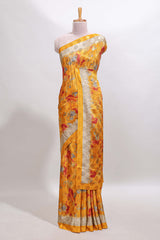 Golden yellow floral design georgette saree with contrast border and matching blouse
