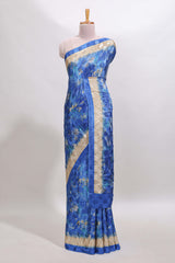 Blue floral design georgette saree with contrast border and matching blouse