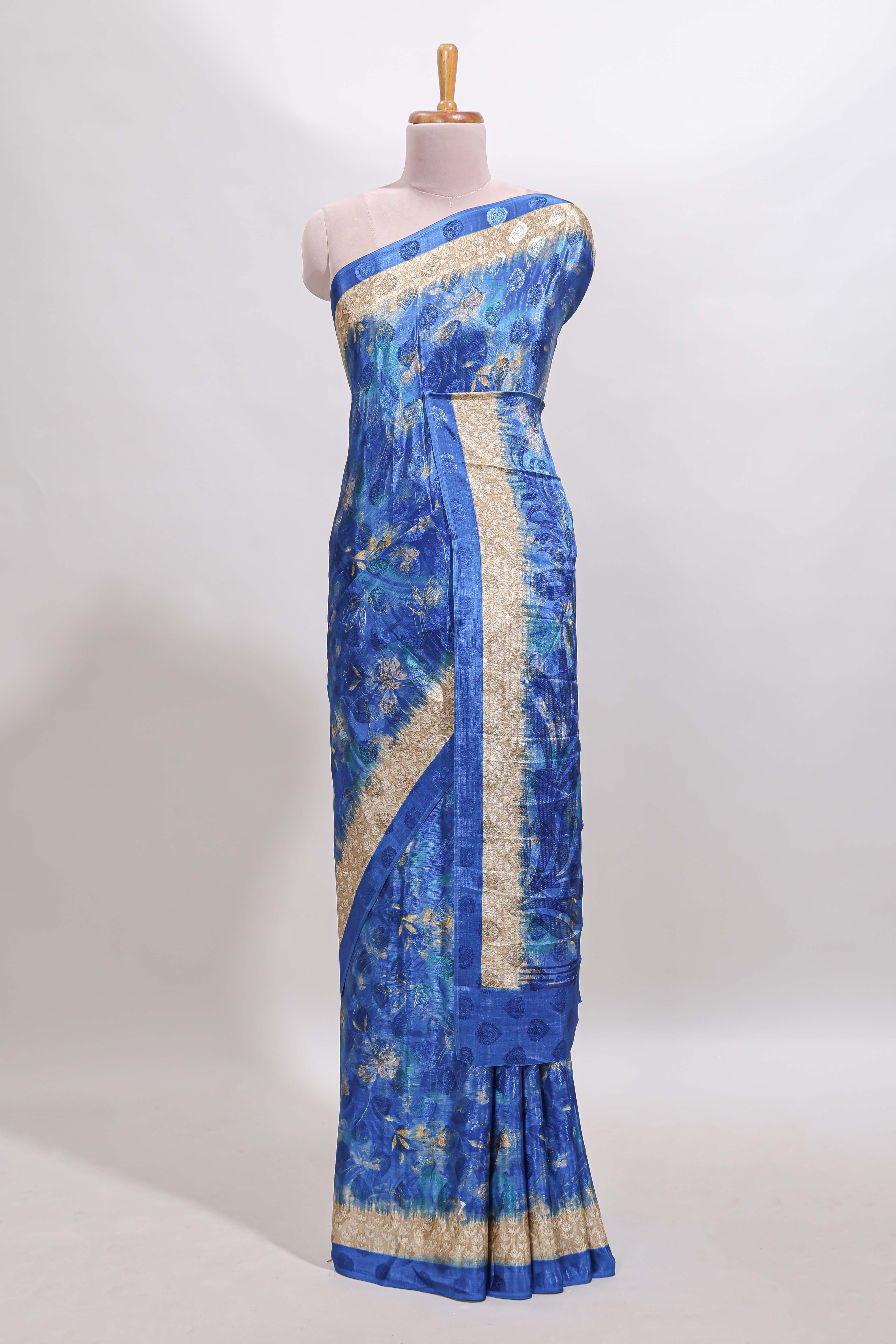 Blue floral design georgette saree with contrast border and matching blouse
