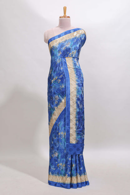 Blue floral design georgette saree with contrast border and matching blouse