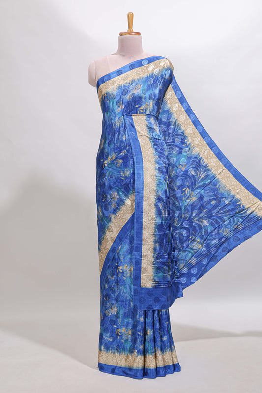 Blue floral design georgette saree with contrast border and matching blouse