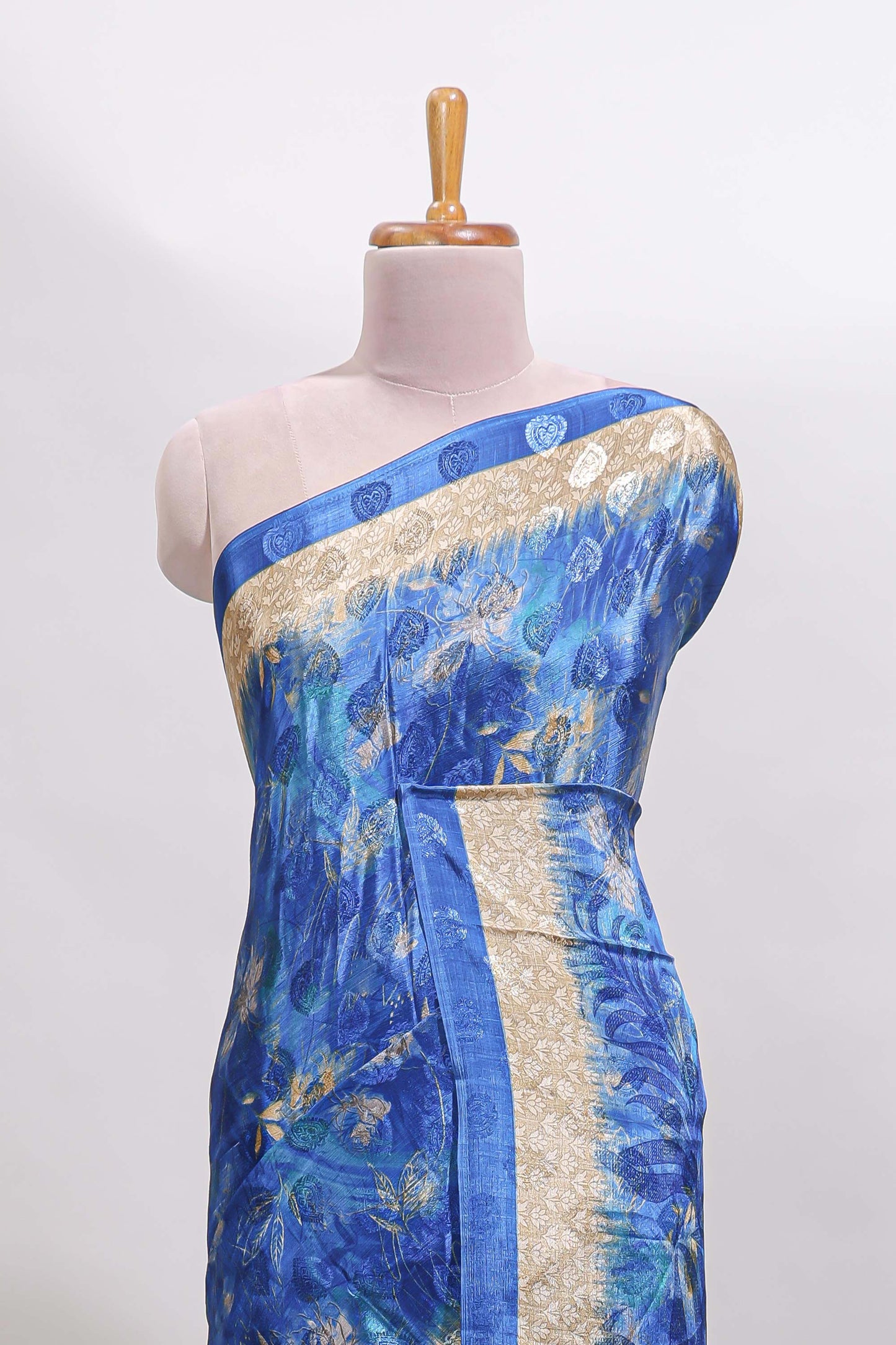 Blue floral design georgette saree with contrast border and matching blouse