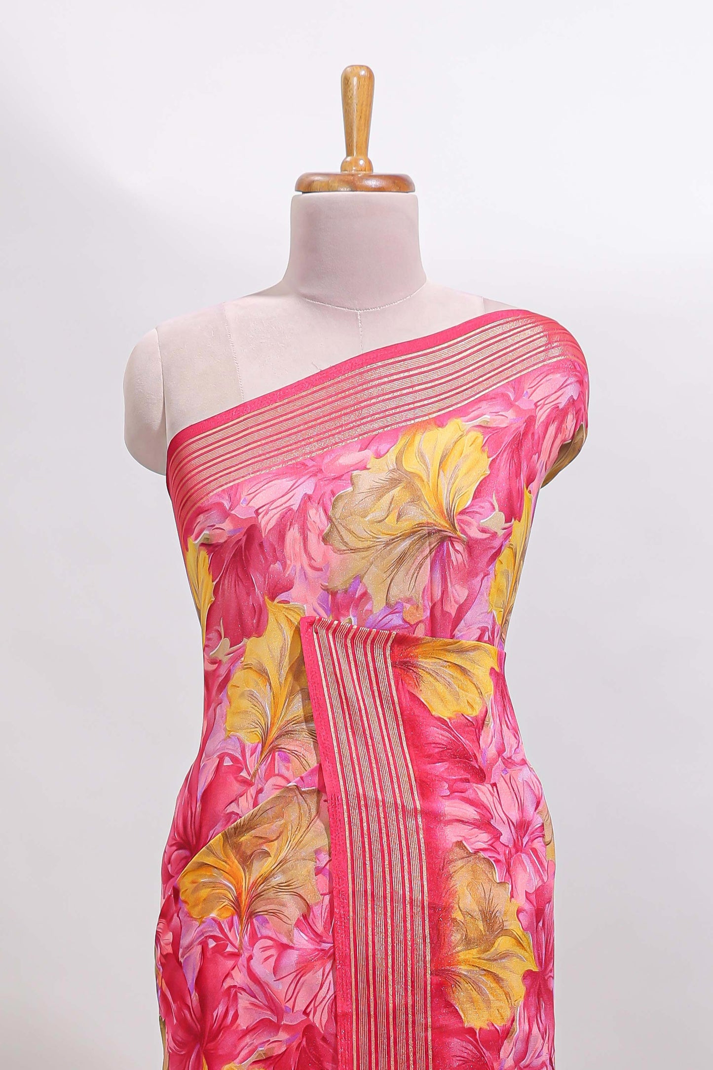 Pink floral design georgette saree with self border and matching blouse