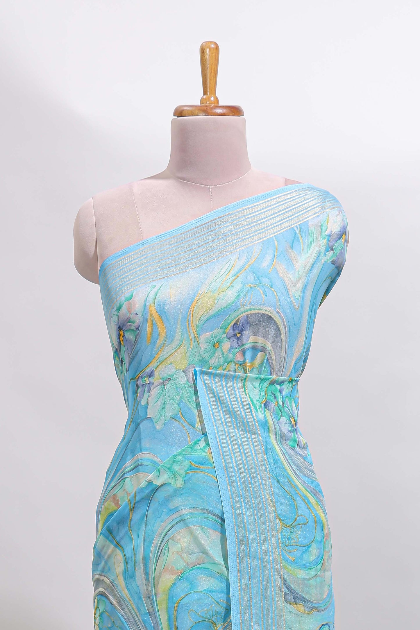 Blue floral design georgette saree with self border and matching blouse