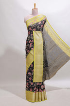 Black floral design georgette saree with contrast border and motifs blouse