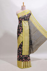 Black floral design georgette saree with contrast border and motifs blouse