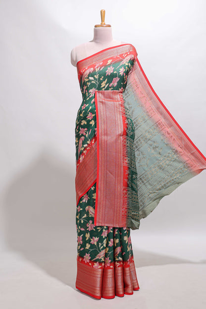 Green floral design georgette saree with contrast border and motifs blouse