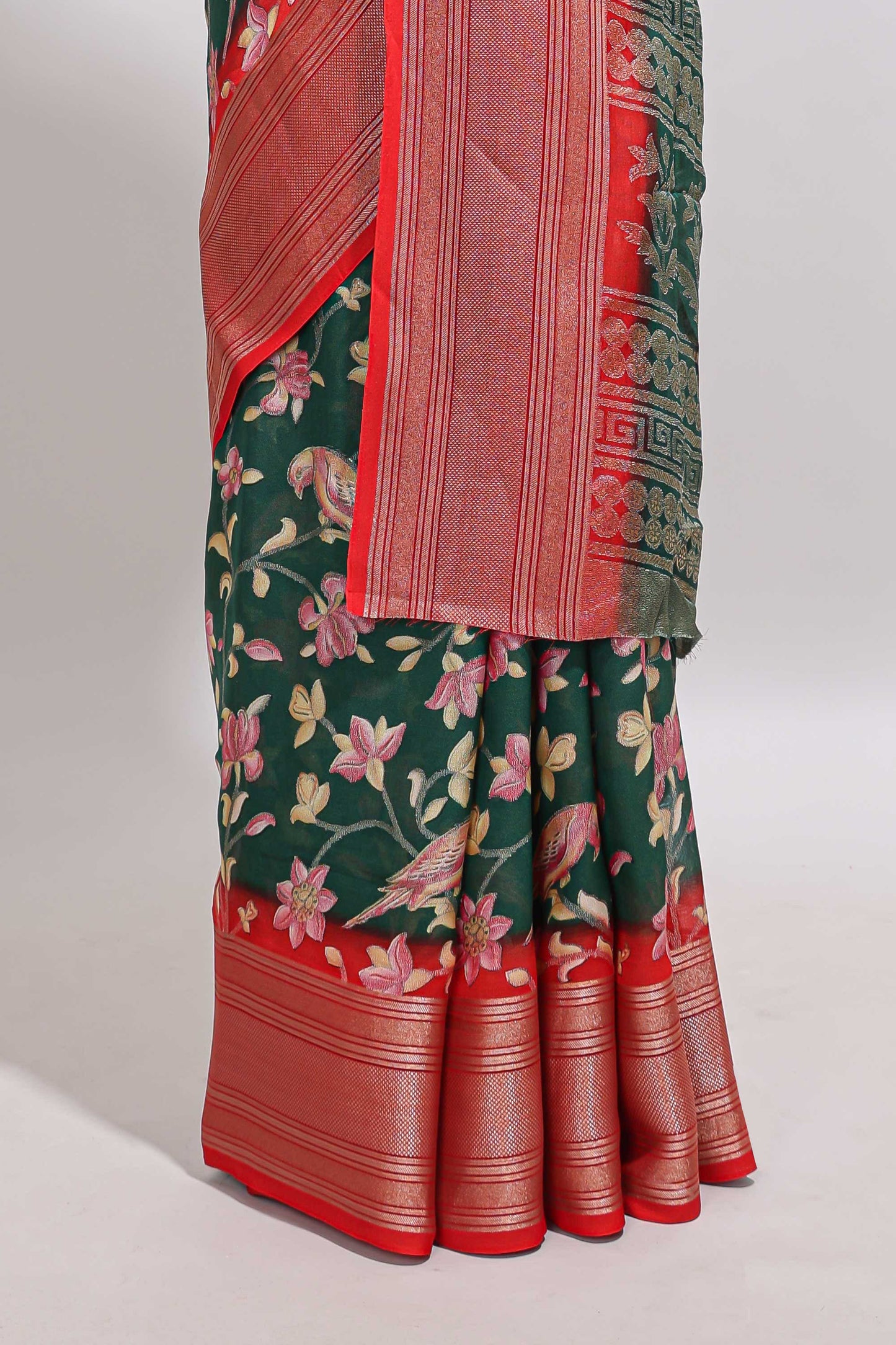 Green floral design georgette saree with contrast border and motifs blouse