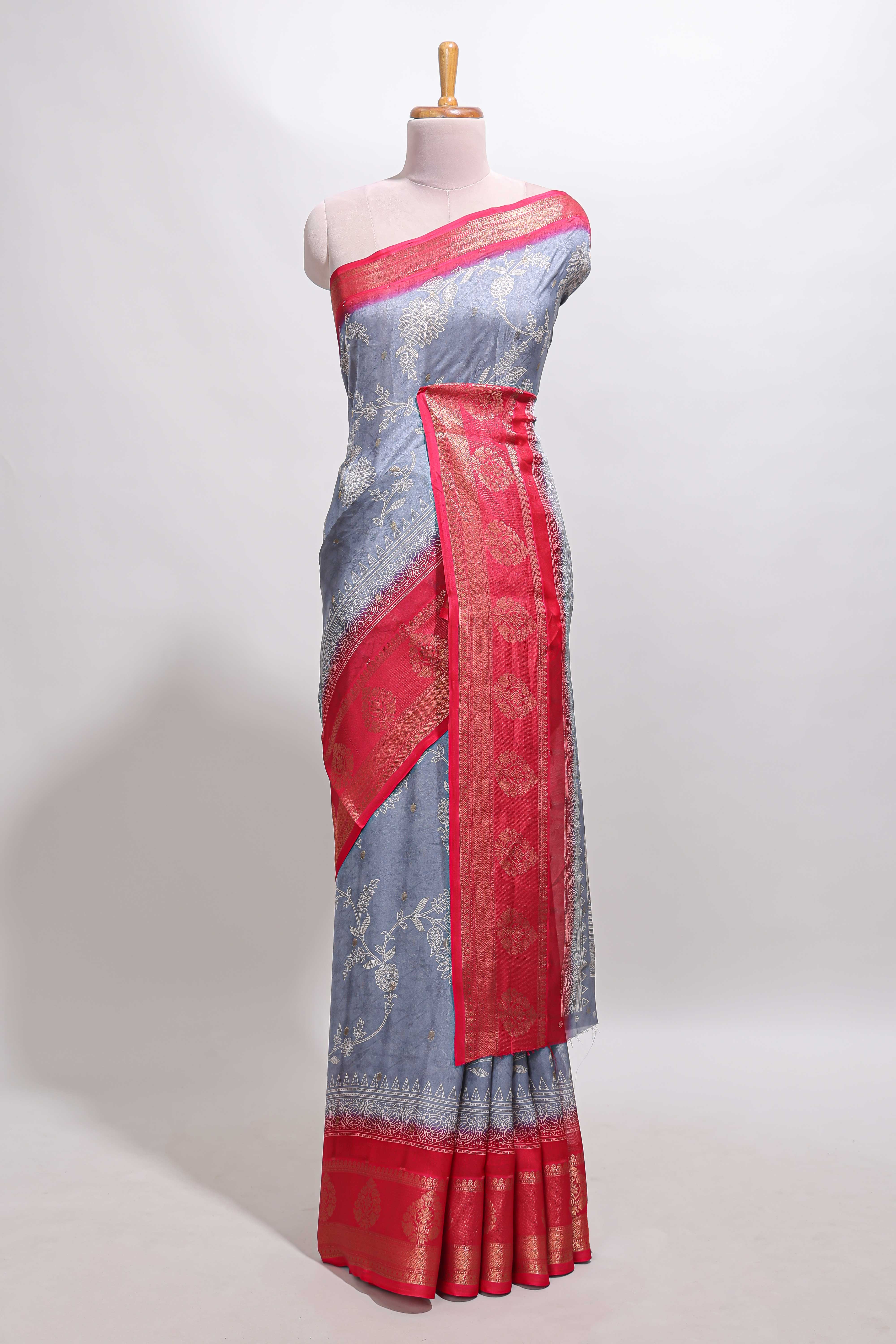 Mauve blue floral design georgette saree with contrast border and motifs blouse