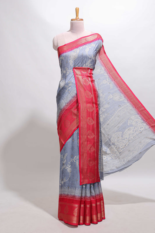 Mauve blue floral design georgette saree with contrast border and motifs blouse