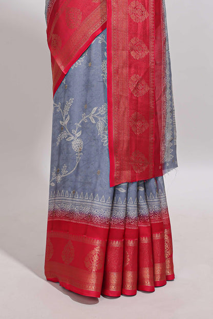 Mauve blue floral design georgette saree with contrast border and motifs blouse
