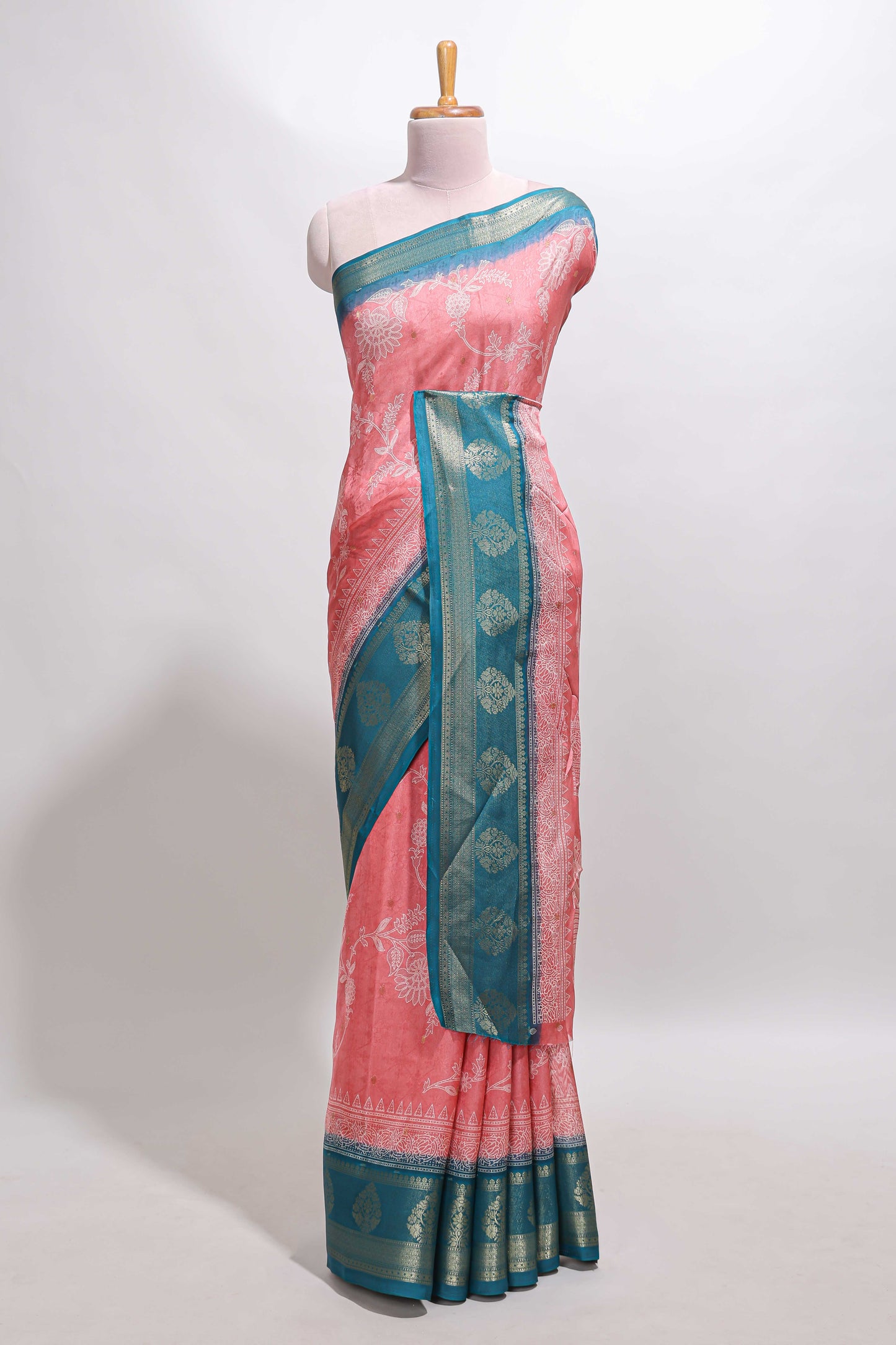 Pink floral design georgette saree with contrast border and motifs blouse
