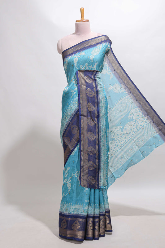 Blue floral design georgette saree with contrast border and motifs blouse