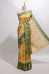 Golden yellow floral design georgette saree with contrast border and motifs blouse