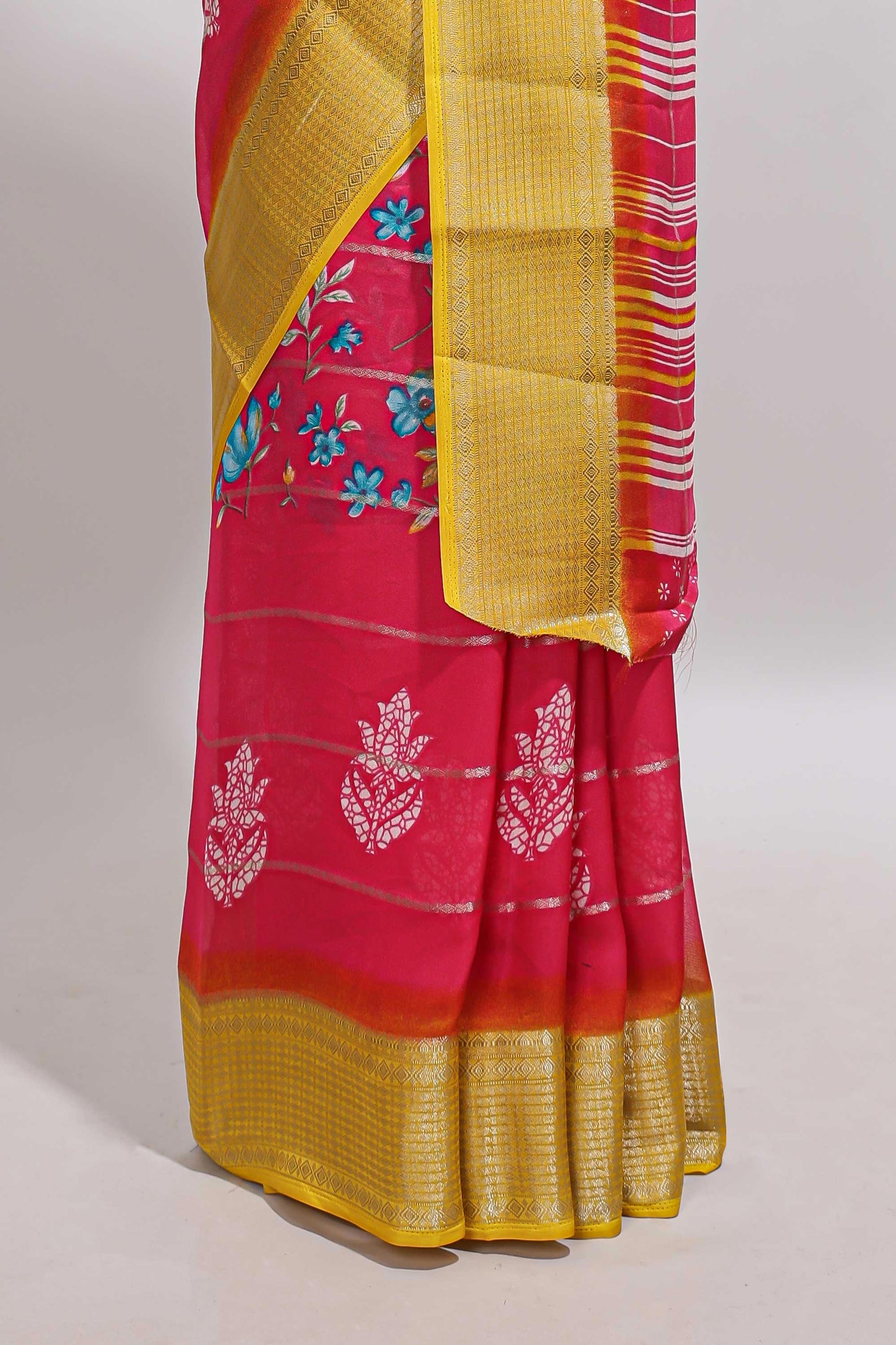 Pink striped floral design georgette saree with contrast border and motifs blouse