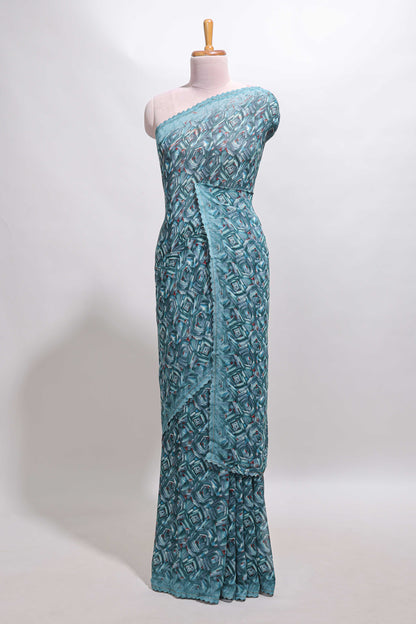 Turquoise blue geometirc digital print georgette saree with self scallop border and matching blouse
