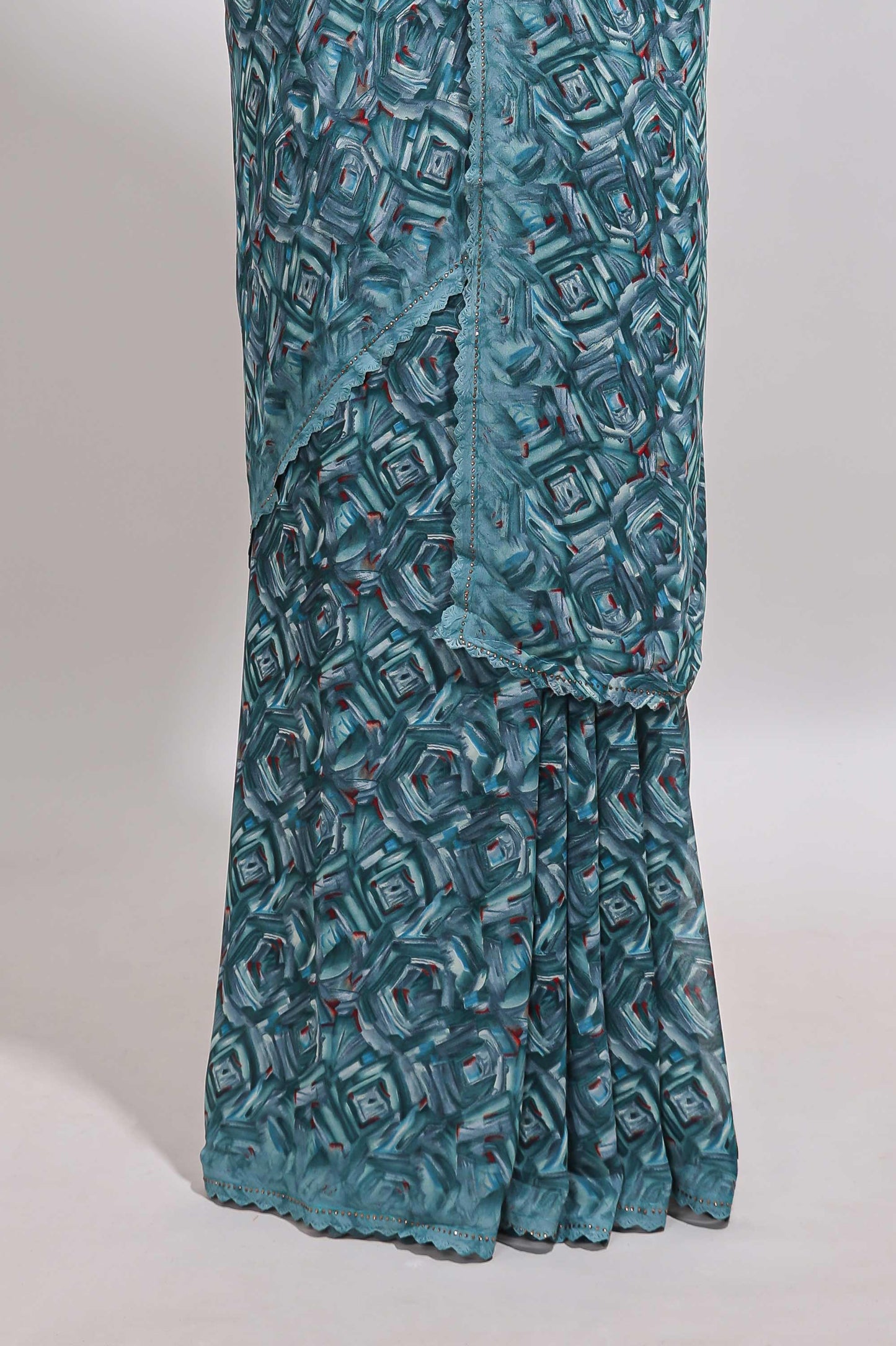 Turquoise blue geometirc digital print georgette saree with self scallop border and matching blouse