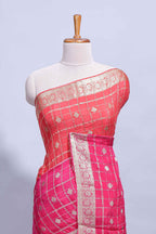Rani Pink and orange double shaded zari checks georgette saree with small zari border and self pallu along with matching zari buttas blouse piece