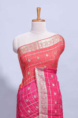 Rani Pink and orange double shaded zari checks georgette saree with small zari border and self pallu along with matching zari buttas blouse piece