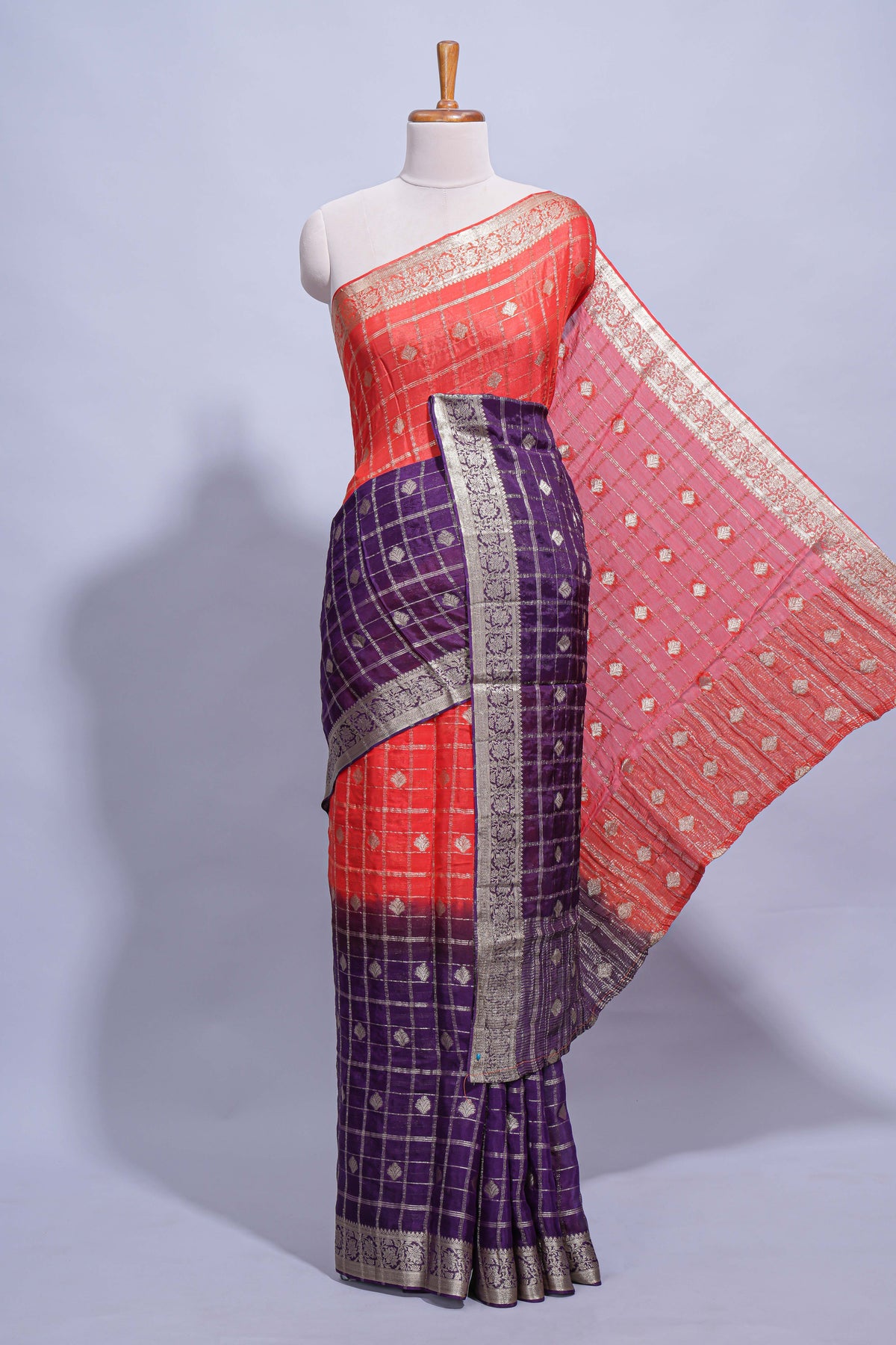 Red and violet double shaded zari checks georgette saree with small zari border and self pallu along with matching zari buttas blouse piece