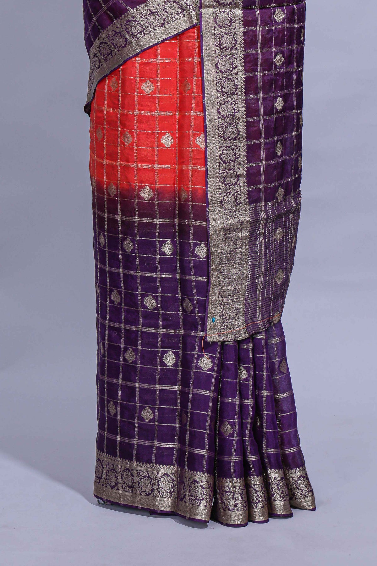 Red and violet double shaded zari checks georgette saree with small zari border and self pallu along with matching zari buttas blouse piece
