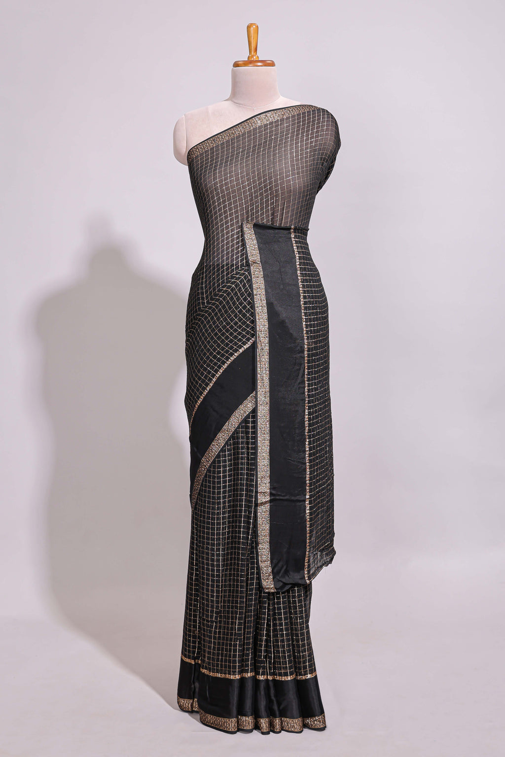 Black zari checks georgette saree with small zari border with self pallu and matching blouse