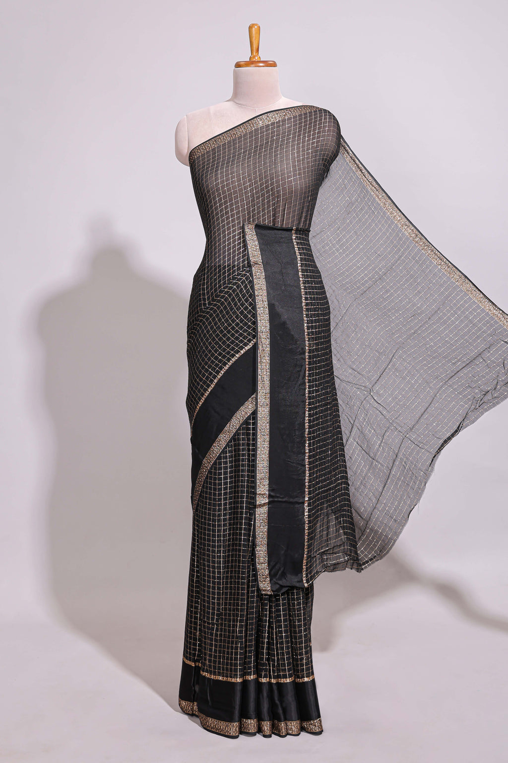 Black zari checks georgette saree with small zari border with self pallu and matching blouse