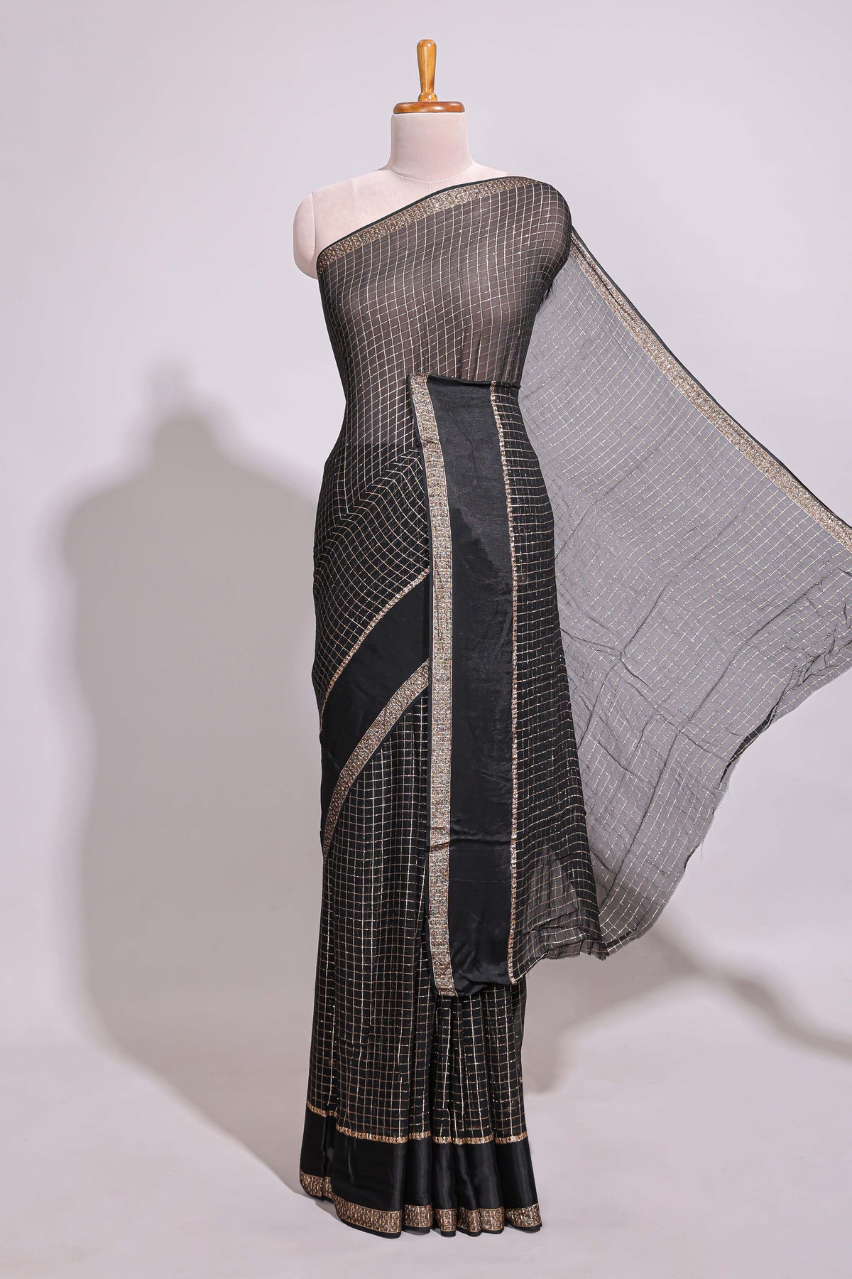Black zari checks georgette saree with small zari border with self pallu and matching blouse