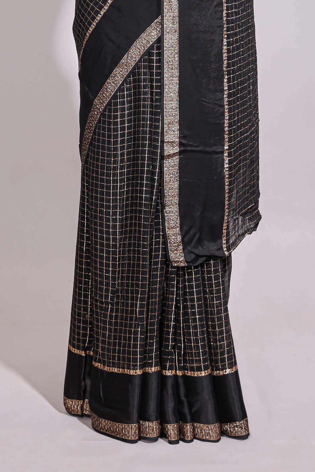 Black zari checks georgette saree with small zari border with self pallu and matching blouse