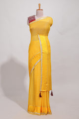 Peach zari checks georgette saree with small zari border and contrast aari work blouse