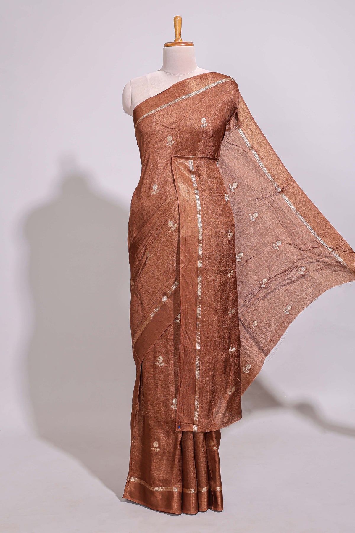 Brown georgette saree all over zari buttas small zari border with self pallu and matching blouse