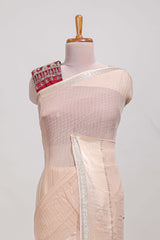 Cream zari checks georgette saree with small zari border and contrast aari work blouse