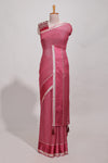 Magenta zari checks georgette saree with small zari border and contrast aari work blouse