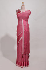 Magenta zari checks georgette saree with small zari border and contrast aari work blouse