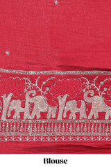 Magenta zari checks georgette saree with small zari border and contrast aari work blouse