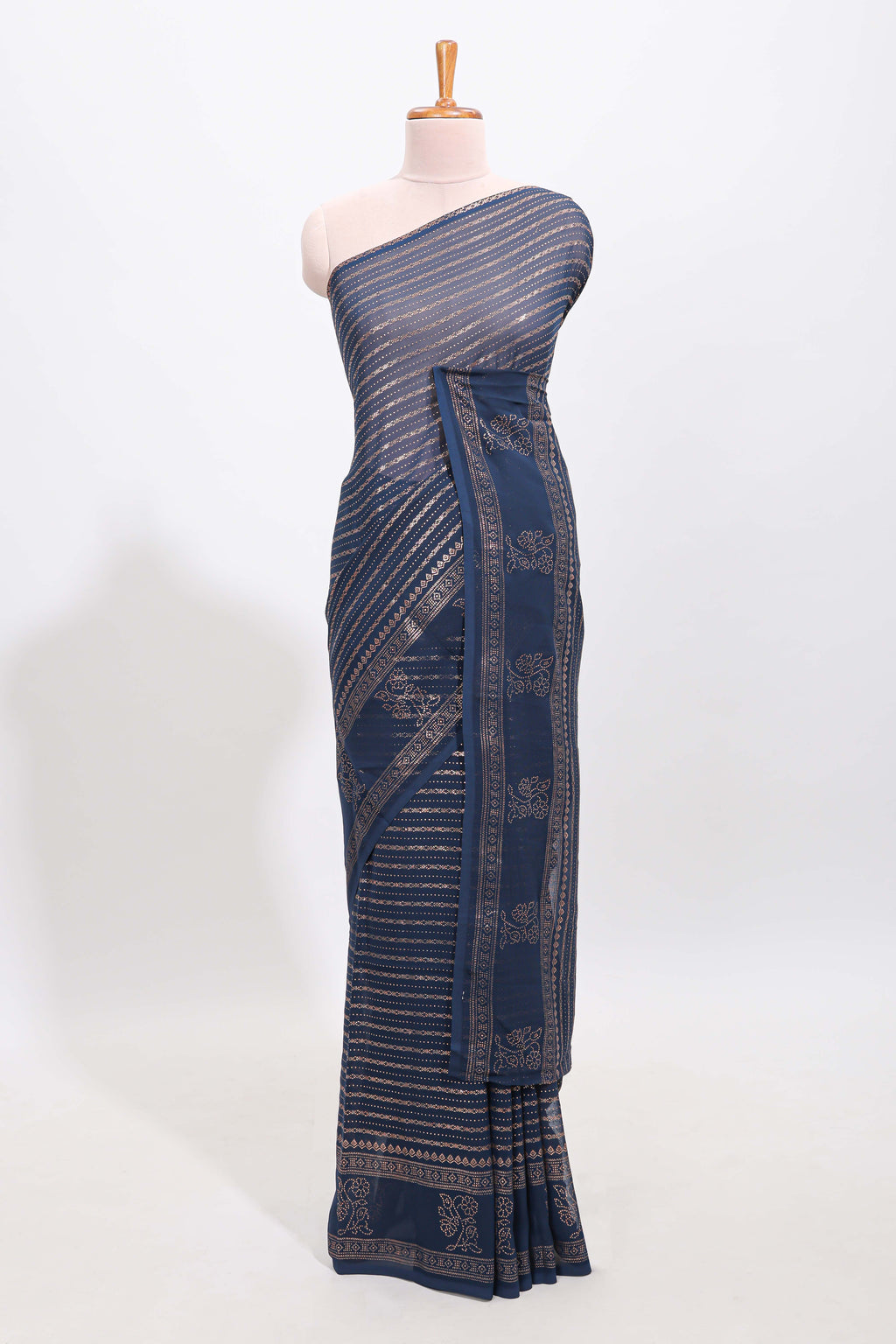Blue vertical zari design georgette saree with self floral design border and matching blouse