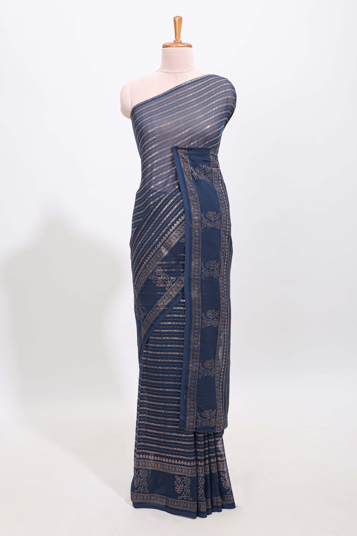 Blue vertical zari design georgette saree with self floral design border and matching blouse