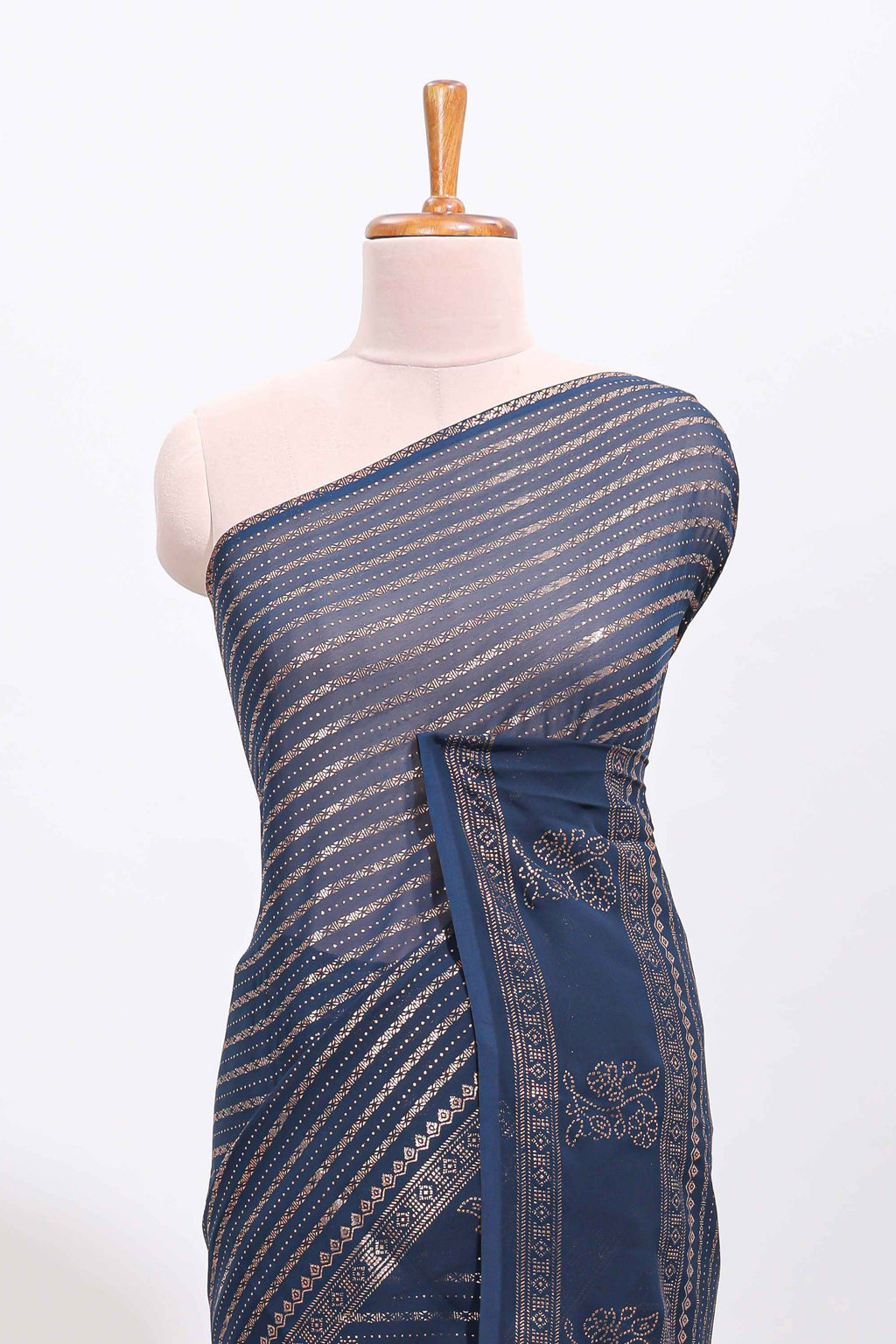 Blue vertical zari design georgette saree with self floral design border and matching blouse