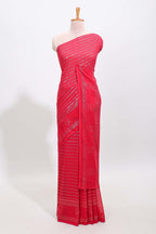 Pink vertical zari design georgette saree with self floral design border and matching blouse