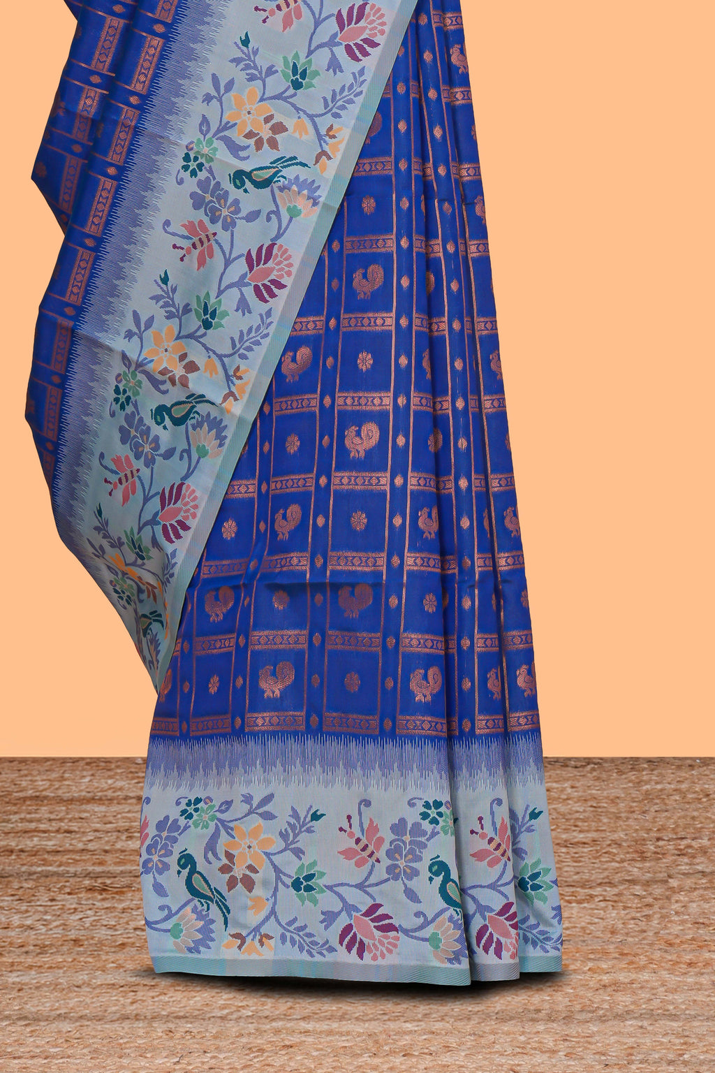 Blue geometric zari motifs ikkat cotton saree with contrast floral & birds design border and zari motifs blouse