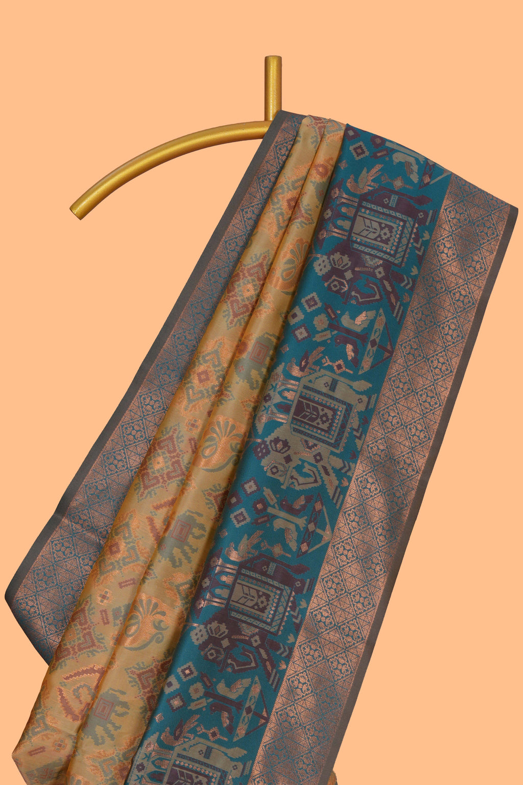 Mustard geometric & elephant motifs design ikkat cotton saree with contrast elephant design border and zari motifs blouse