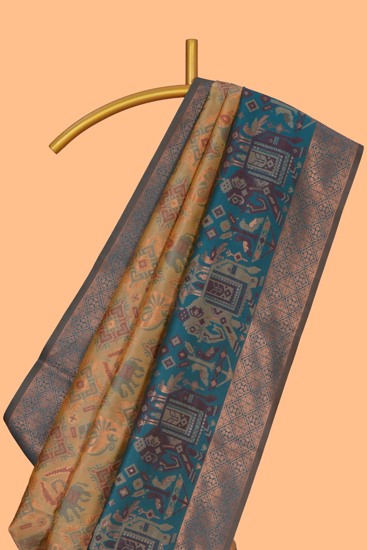 Mustard geometric & elephant motifs design ikkat cotton saree with contrast elephant design border and zari motifs blouse