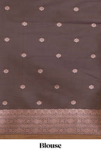 Mustard floral design ikkat cotton saree with contrast zari design border and zari floral motifs blouse