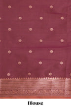 Orange floral design ikkat cotton saree with contrast zari design border and zari floral motifs blouse