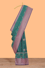 Green floral design zari motifs ikkat cotton saree with contrast zari design border and zari floral motifs blouse